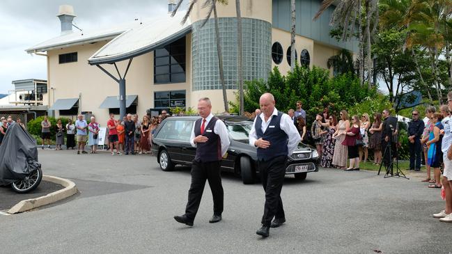 Mourners gathered outside to farewell Andy Heard at the Cairns Cruising Yacht Squadron. PICTURE: TOBY VUE