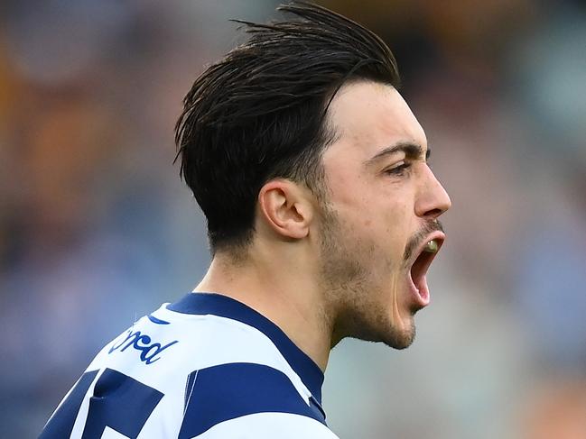 MELBOURNE, AUSTRALIA - APRIL 10: Brad Close of the Cats celebrates kicking a goal during the round four AFL match between Geelong Cats and Hawthorn Hawks at Melbourne Cricket Ground, on April 10, 2023, in Melbourne, Australia. (Photo by Quinn Rooney/Getty Images)