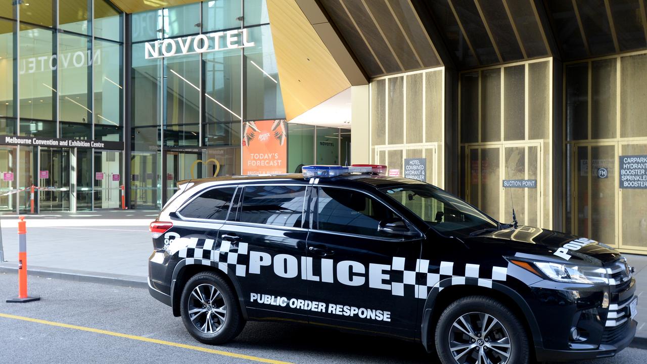 Victoria Police Protective Service Officers monitoring hotel quarantine guests at the Novotel South Wharf. Picture: NCA NewsWire / Andrew Henshaw