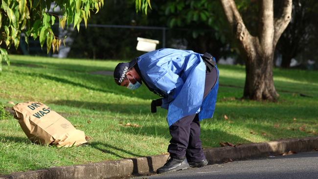 Police and paramedics at the scene of a stabbing at Acacia Ridge. Picture: David Clark