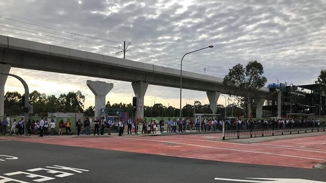 Huge line of people stuck waiting for buses at Kellyville. Picture: Gav Lamb