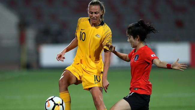 Emily Van Egmond searches for a way through the South Korean defence.