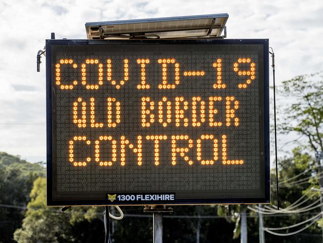 A road sign warning motorists of the COVID-19 QLD border control at Bilinga. Picture: Jerad Williams