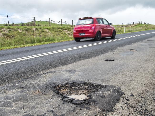 Pot holes in Country roads .Picture:Rob Leeson.