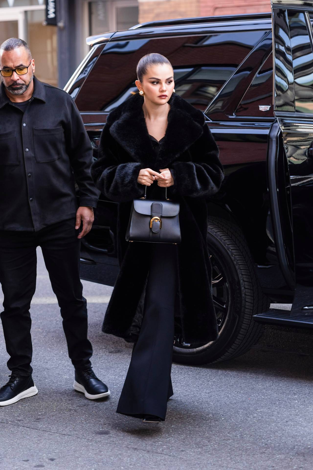 Selena Gomez s Black Handbag Is The Embodiment of Quiet Luxury Vogue Australia