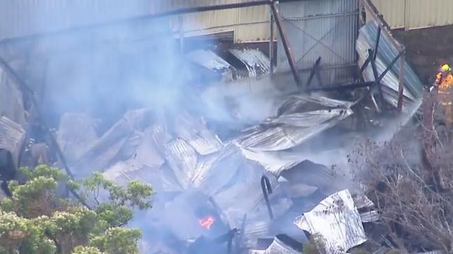 The fire started on one property on Todman St and spread to two others. Picture: 9 News Queensland/Today Show