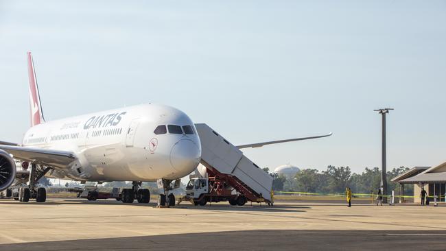 A Qantas flight carrying Australian citizens returning from India touches down at RAAF Base Darwin, with passengers to be transported to the Howard Springs quarantine facility. Picture: ADF, Supplied