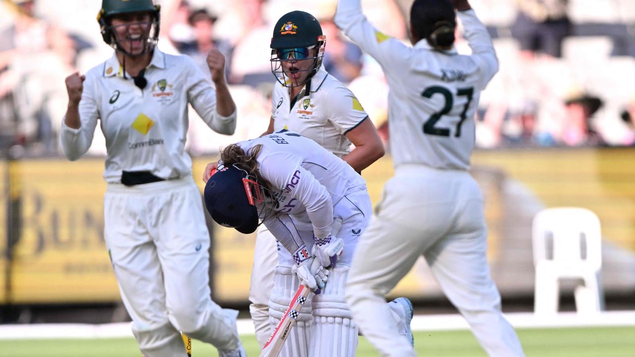 England's Tammy Beaumont reacts to being bowled by Australia's Alana King. (Photo by William WEST / AFP)