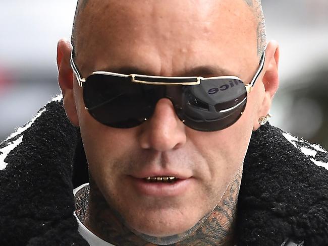 Former Bandido club enforcer Toby Mitchell arrives at Melbourne Magistrates Court, Melbourne, Thursday, March 15, 2018. Mitchell is charged with affray, intentionally causing injury and assault following an alleged incident at Southbank in December. (AAP Image/Joe Castro) NO ARCHIVING