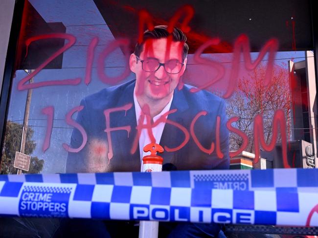 The slogan "Zionism is Fascism" is sprayed on the electoral office of Australian federal Labor Party member of parliament Josh Burns in the Melbourne suburb of St Kilda after police said at least five people smashed windows and painted slogans on the walls on June 19, 2024. It is the latest in a string of acts of vandalism targeting the offices of state and federal MPs in the wake of the conflict in Gaza. (Photo by William WEST / AFP)