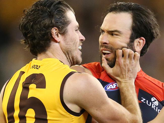 AFL 1st Semi-Final. 14/09/2018. Hawthorn vs Melbourne at the MCG.  Hawthorn's Isaac Smith wrestles with Melbourne's Jordan Lewis   . Pic: Michael Klein