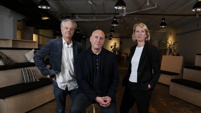 Mark Green, president, Accenture Song ANZ and co-founder The Monkeys (centre) photographed with Mark Sundquist and Karen Phillips, both Partners at Fiftyfive5. Britta Campion / The Australian