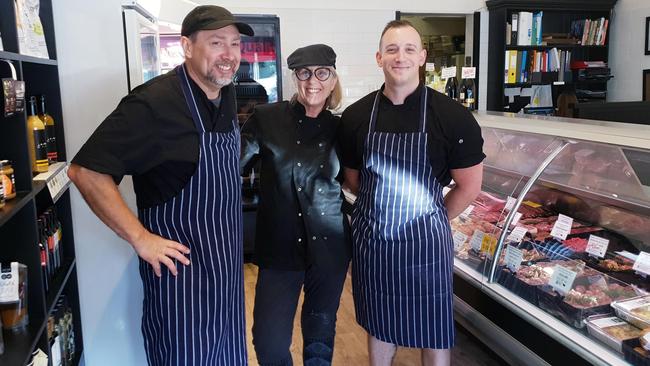 Mick Blackburn with wife Sue and fellow butcher Joe Moran.