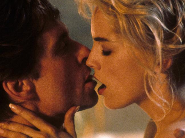 Michael Douglas and Sharon Stone kissing in scene from the film 'Basic Instinct', 1992. (Photo by TriStar/Getty Images) Picture: Getty