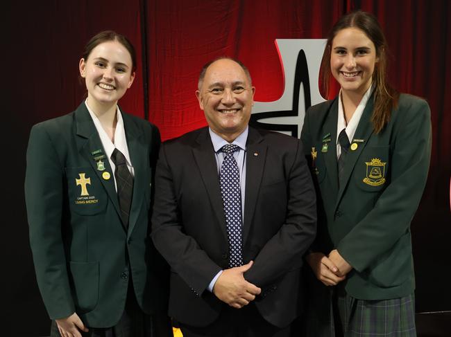 St Joseph's College Stanthorpe school captains Taylah Organ (L) and Hannah Widderick (R) with principal Andrew Kendall OAM at their awards night. Photo: Supplied