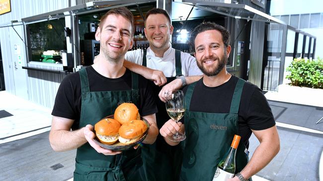 Former MasterChef star Callum Hann and business partner Themis Chryssidis (front) at their ‘eleven’ bar and restaurant, with head chef Daniel Murphy. Picture: Mark Brake