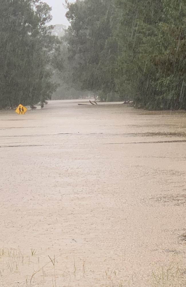 The Brewer’s Road bridge in Nana Glen is completely under as the Orara River continues to rise with moderate to major flooding.