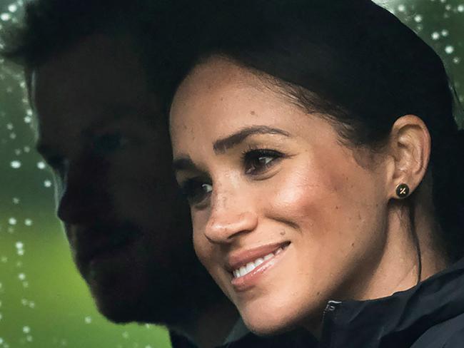 (FILES) In this file photo Britain's Prince Harry and his wife Meghan, Duchess of Sussex arrive for the unveiling of a plaque dedicating 20 hectares of native bush to the Queen's Commonwealth Canopy project at The North Shore Riding Club in Auckland on October 30, 2018. - Britain's Prince Harry, who has blamed press intrusion for contributing to his mother Princess Diana's death in 1997, has told US chat show host Oprah Winfrey he was worried about history repeating itself. Harry and his wife Meghan Markle rocked Britain's monarchy with their shock announcement in January 2020 that they were stepping back from royal duties. CBS on February 28, 2021 released brief clips of an "intimate" interview with Winfrey about their lives which will air March 7. (Photo by STR / POOL / AFP)