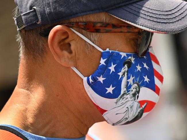 Several Democratic-run US states have announced plans to lift mask mandates in indoor places and schools. Picture: Robyn Beck / AFP.