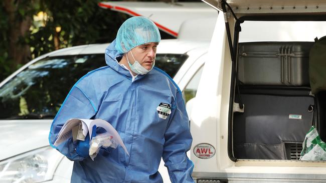 Police investigate the scene of a double murder at Joyner, north of Brisbane. Photographer: Liam Kidston.