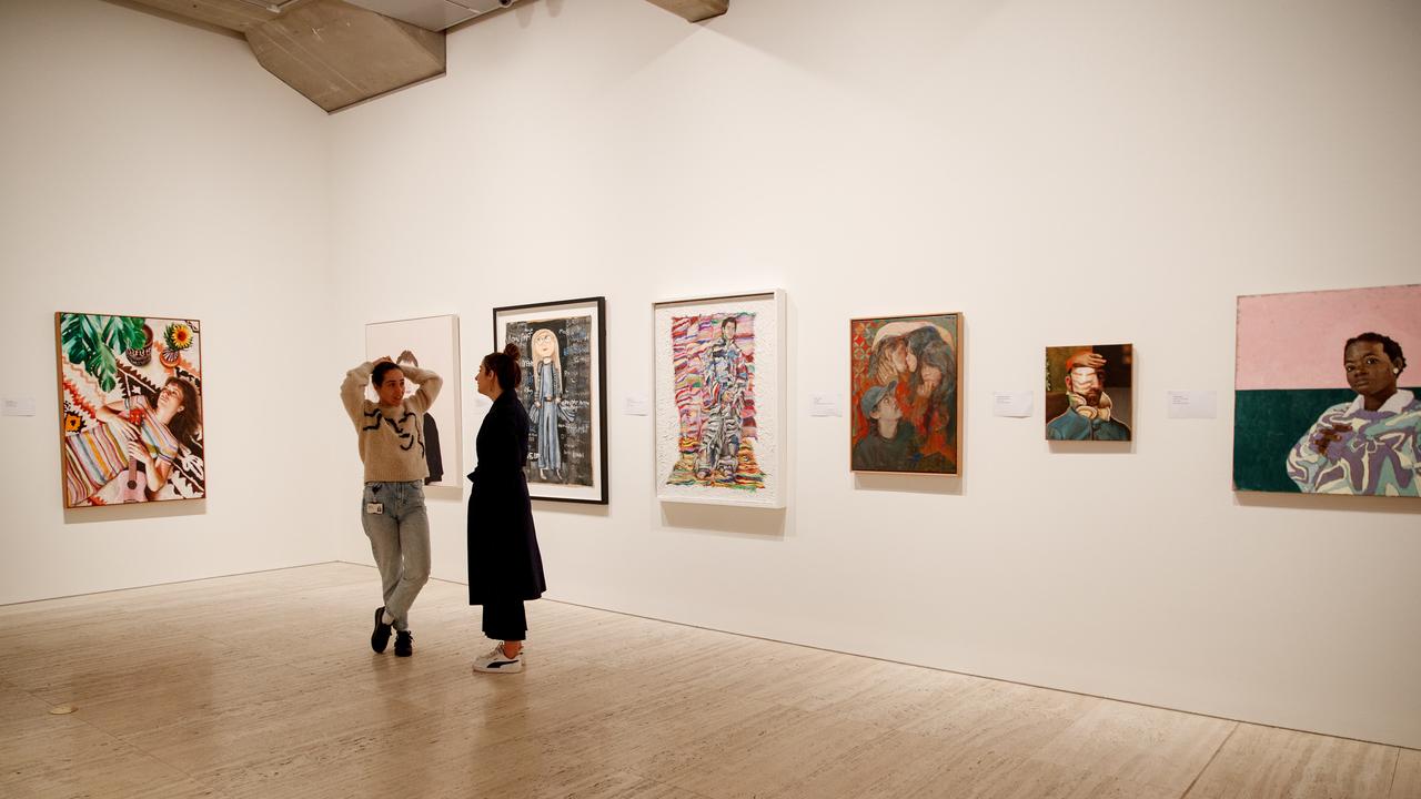 People preview the Archibald entries at the announcement of the Packing Room Prize at The Art Gallery of NSW on Thursday. Picture: NCA NewsWire / Nikki Short