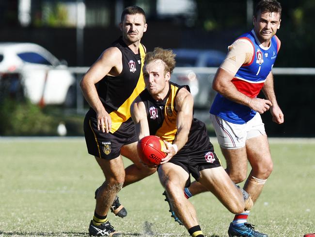 Tigers' James Neale controls the ball in the AFL Cairns men's premiership match between the North Cairns Tigers and the Central Trinity Beach Bulldogs, held at Watson's Oval Manunda. Picture: Brendan Radke