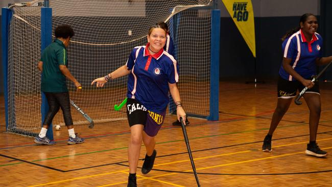 Tilly Palmer scores as Olympians and scholarship coaches run training sessions for Katherine youth at RAAF Base Tindal. Picture: Pema Tamang Pakhrin