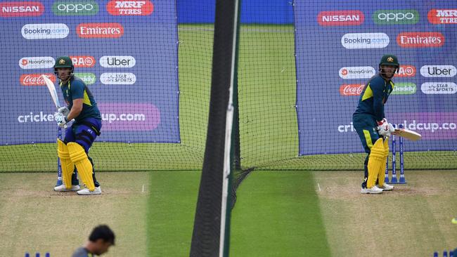 David Warner (R) trains at The Oval. Picture: AFP