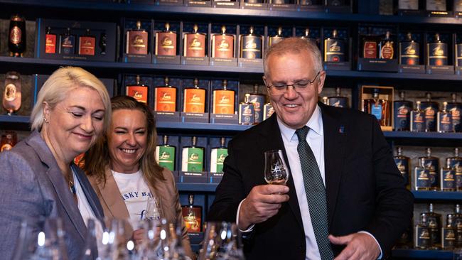 Mr Morrison visiting the Lark Distillery with the candidate for Lyons, Susie Bower. Picture: Jason Edwards