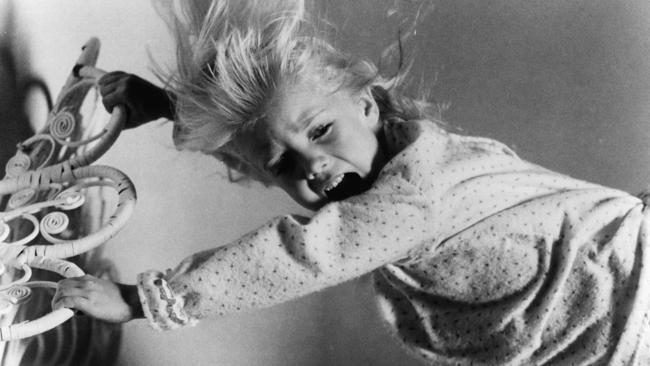 Heather O'Rourke screams as she is harassed by evil spirits in a scene from the film Poltergeist. Picture: Metro-Goldwyn-Mayer