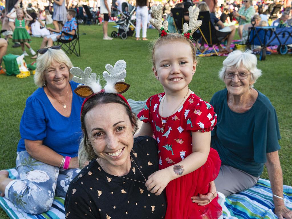 Tahni Muir and daughter Willow Muir with Jenelle Streeter (left) and Denise Bryant (right) at Triple M Mayoral Carols by Candlelight, Sunday, December 8, 2024. Picture: Kevin Farmer