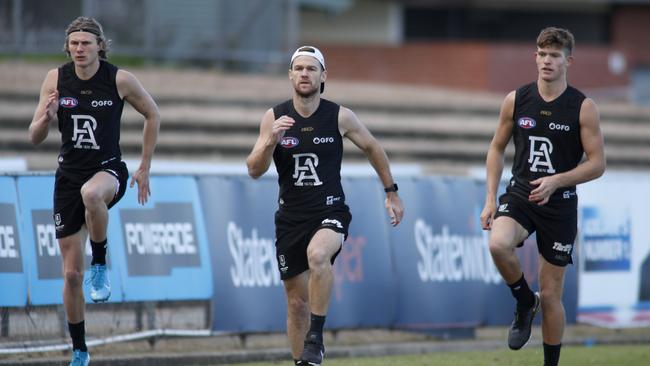 Robbie Gray, centre, at Port Adelaide training at Alberton Oval on Saturday morning. Picture: Kelly Barnes