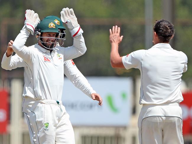 Stephen O’Keefe (right) enjoyed a breakthrough tour of India. Picture: AFP