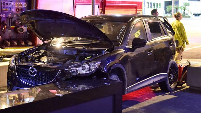 A group of juveniles armed with knives allegedly lead police on a chase across the city, stealing a car and smashing into another tonight. A Queensland Police Service spokeswoman confirmed a car was first stolen on Flinders St about 7.15pm. PICTURE: MATT TAYLOR.