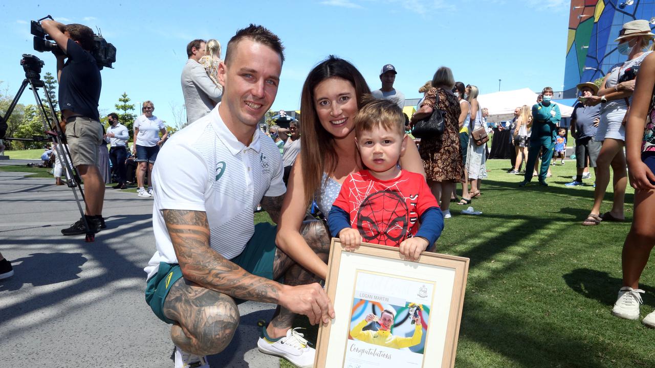 Welcome home to Gold Coast Olympic and Paralympic athletes at HOTA. Logan Martin with wife Kimberley Martin and Noah Martin (4). 3 October 2021 Surfers Paradise Picture by Richard Gosling