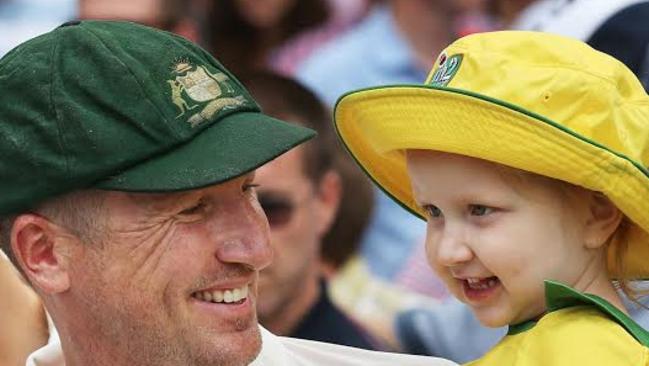 Brad Haddin with daughter Mia.