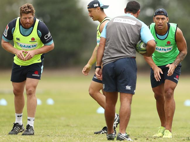 SYDNEY, AUSTRALIA - MAY 24:  Israel Folau listens to coach Daryl Gibson during a Waratahs Super Rugby training session at David Phillips Sports Complex on May 24, 2018 in Sydney, Australia.  (Photo by Mark Metcalfe/Getty Images)