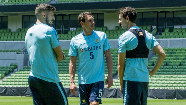 Socceroos stars (l-r) Mathew Leckie, Mark Milligan and Robbie Kruse train in Melbourne ahead of the World Cup playoff with Honduras.