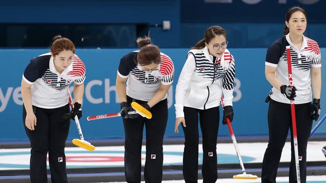 South Korea's curling team after winning against Sweden at Gangneung. Picture: AP