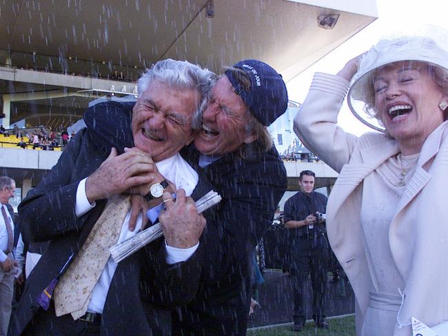 April 15, 2000: Hawke, advertising executive John Singleton and wife Blanche d’Alpuget celebrate the Golden Slipper win of Belle Du Jour at Rosehill.