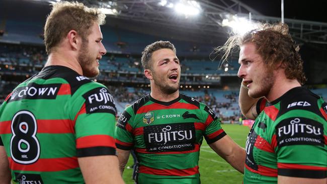 Souths Sam Burgess with his brothers Tom and George after victory in the South Sydney v St. George-Illawarra NRL Semi Final at ANZ Stadium, Homebush. Picture: Brett Costello