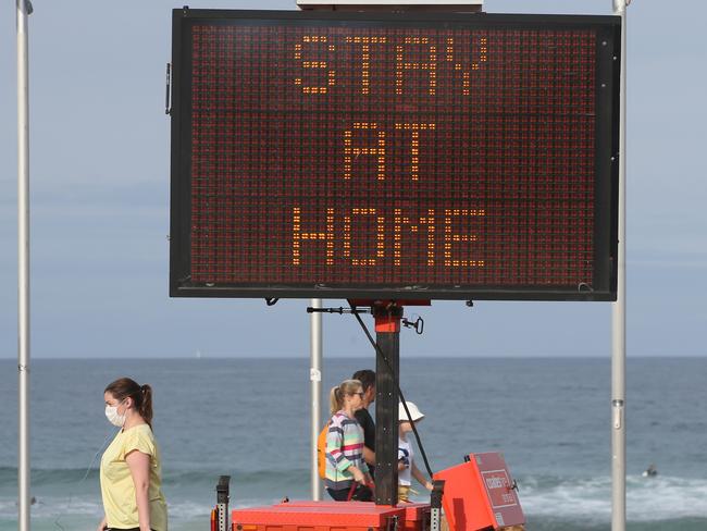 People out and about at Manly Beach on the Northern beaches while the NSW Health order is in place. 20th December, 2020. A NSW Health order is in place across the Northern Beaches requiring all Northern Beaches residents to avoid leaving home unless for essential reasons.Picture by Damian Shaw