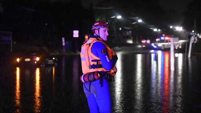 SES teams at flooding in Milperra. Picture: Gordon McComiskie