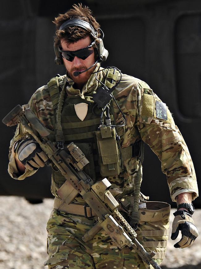 Mr Roberts-Smith on tour in Afghanistan, where he was awarded the top honour, the Victoria Cross, but became a divisive figure in the SAS, the court has heard.