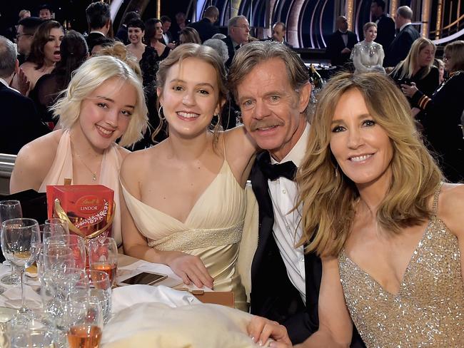 LOS ANGELES, CA - JANUARY 06: (L-R) Sofia Grace Macy, Georgia Grace Macy, William H. Macy, and Felicity Huffman attend FIJI Water at the 76th Annual Golden Globe Awards on January 6, 2019 at the Beverly Hilton  in Los Angeles, California.  (Photo by Stefanie Keenan/Getty Images for FIJI Water)