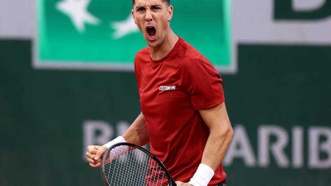 PARIS, FRANCE - MAY 28: Thanasi Kokkinakis of Australia celebrates against Alexei Popyrin of Australia in the Men's Singles first round match on Day Three of the 2024 French Open at Roland Garros on May 28, 2024 in Paris, France. (Photo by Dan Istitene/Getty Images)