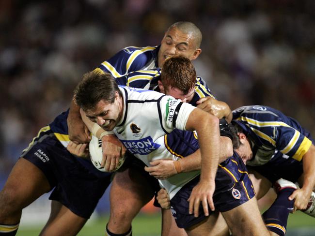 Dane Carlaw gets tackled.