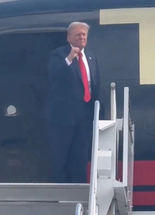 Trump waved to supporters from his private jet as he touched down in Georgia. Picture: Twitter