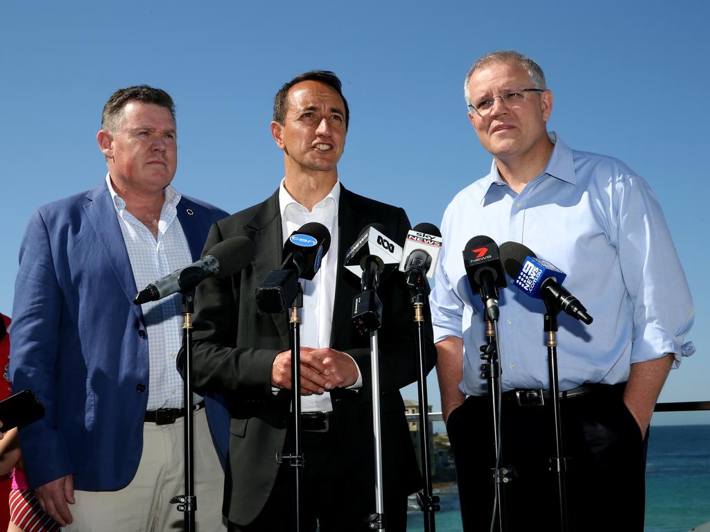 North Bondi Surf Life Saving Club president Mark Cotter, Liberal candidate for Wentworth, Dave Sharma and Prime Minister Scott Morrison speaking at a press conference at North Bondi Surf Club earlier this week. Picture: Jane Dempster