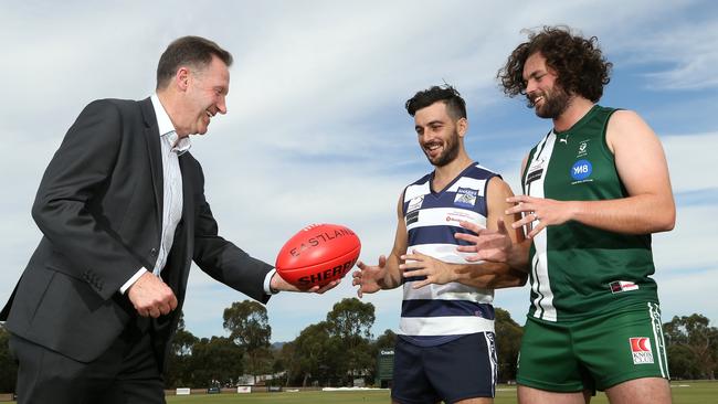 Eastland general manager Greg Balmforth and EFL players Chris Annakis and Jackson Freeman. Picture: Hamish Blair